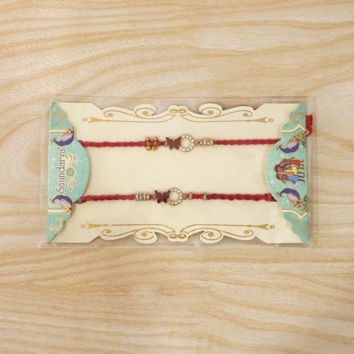 Side view of Mirror Stone Bhabhi Rakhi and red thread