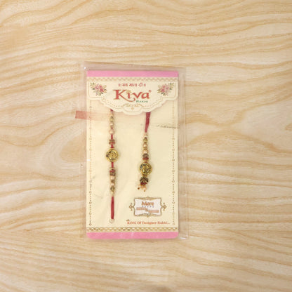 Antique Round Bhabhi Rakhi with pearl drop displayed on white background