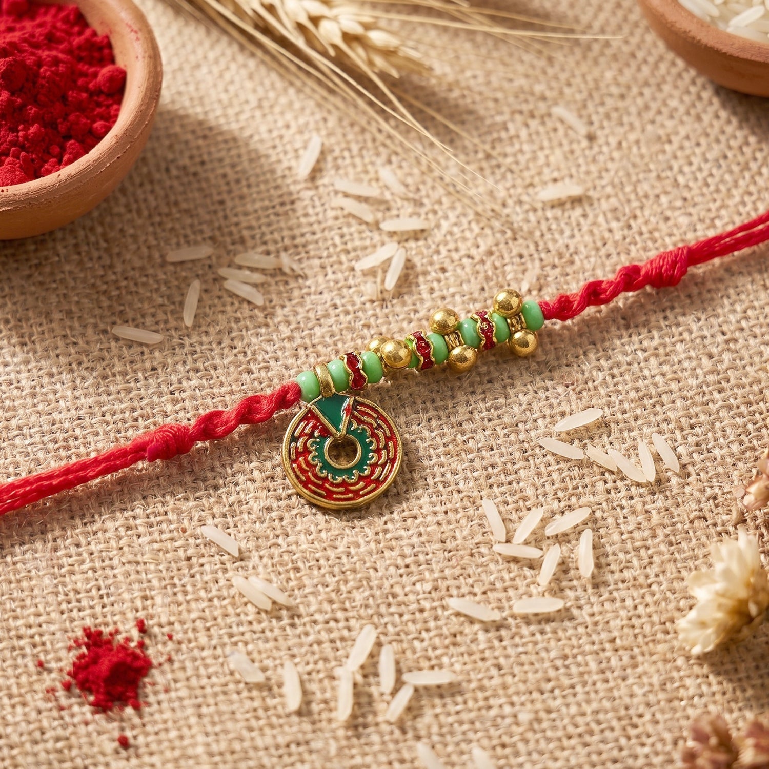 Elegant pearl detail on Floral Stone Bhabhi Rakhi close-up