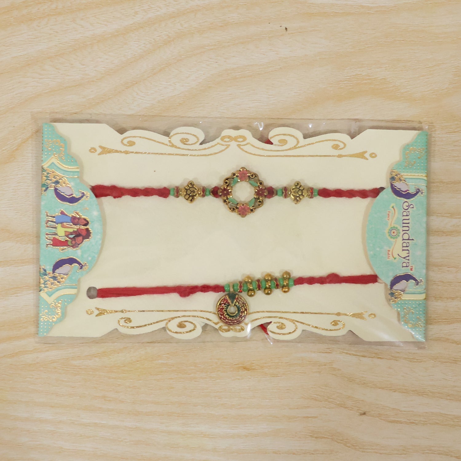 Floral Stone Bhabhi Rakhi displayed with traditional gift elements
