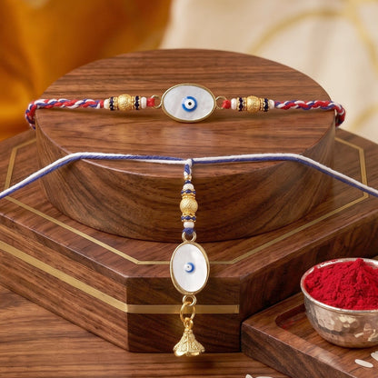 Top view of Evil Eye Bhabhi Rakhi with white bead latkan