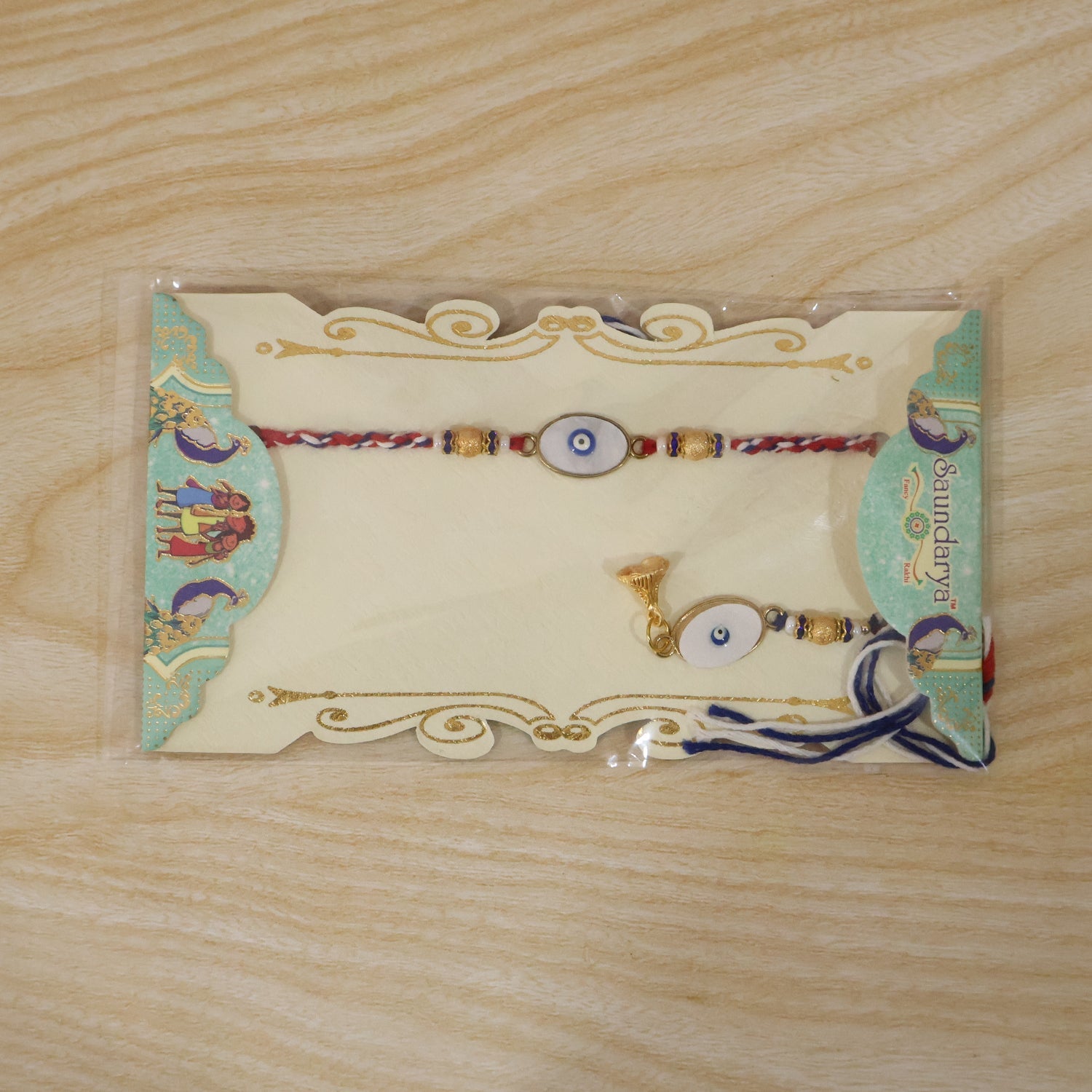 Evil Eye Bhabhi Rakhi displayed on traditional background