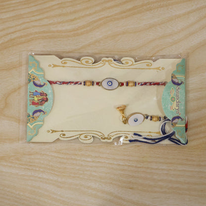Evil Eye Bhabhi Rakhi displayed on traditional background