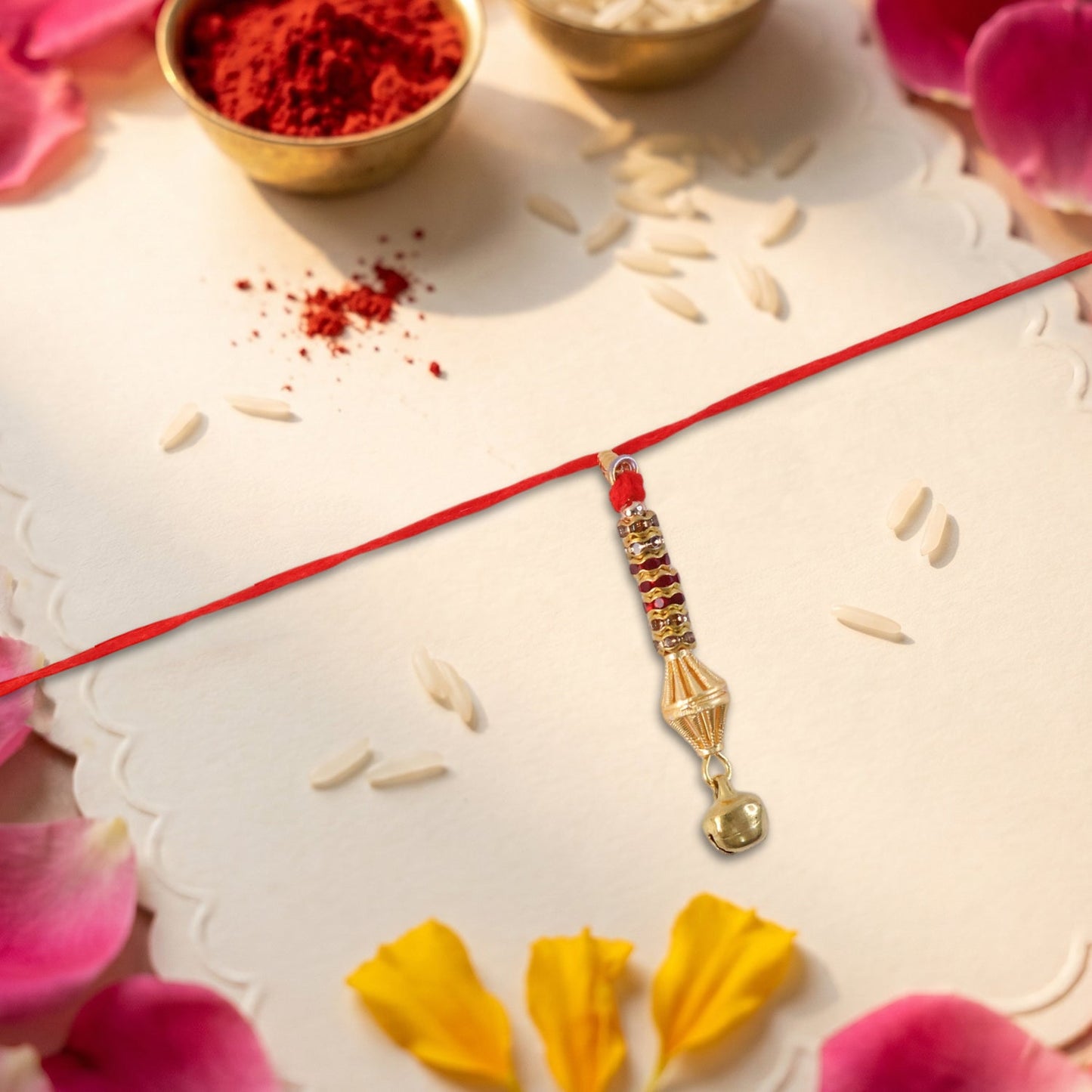 Elegant Bhabhi Rakhi with pearl beads and gold latkan detail