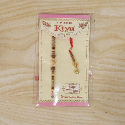 Detailed shot of gold latkan on pearl bead Bhabhi Rakhi