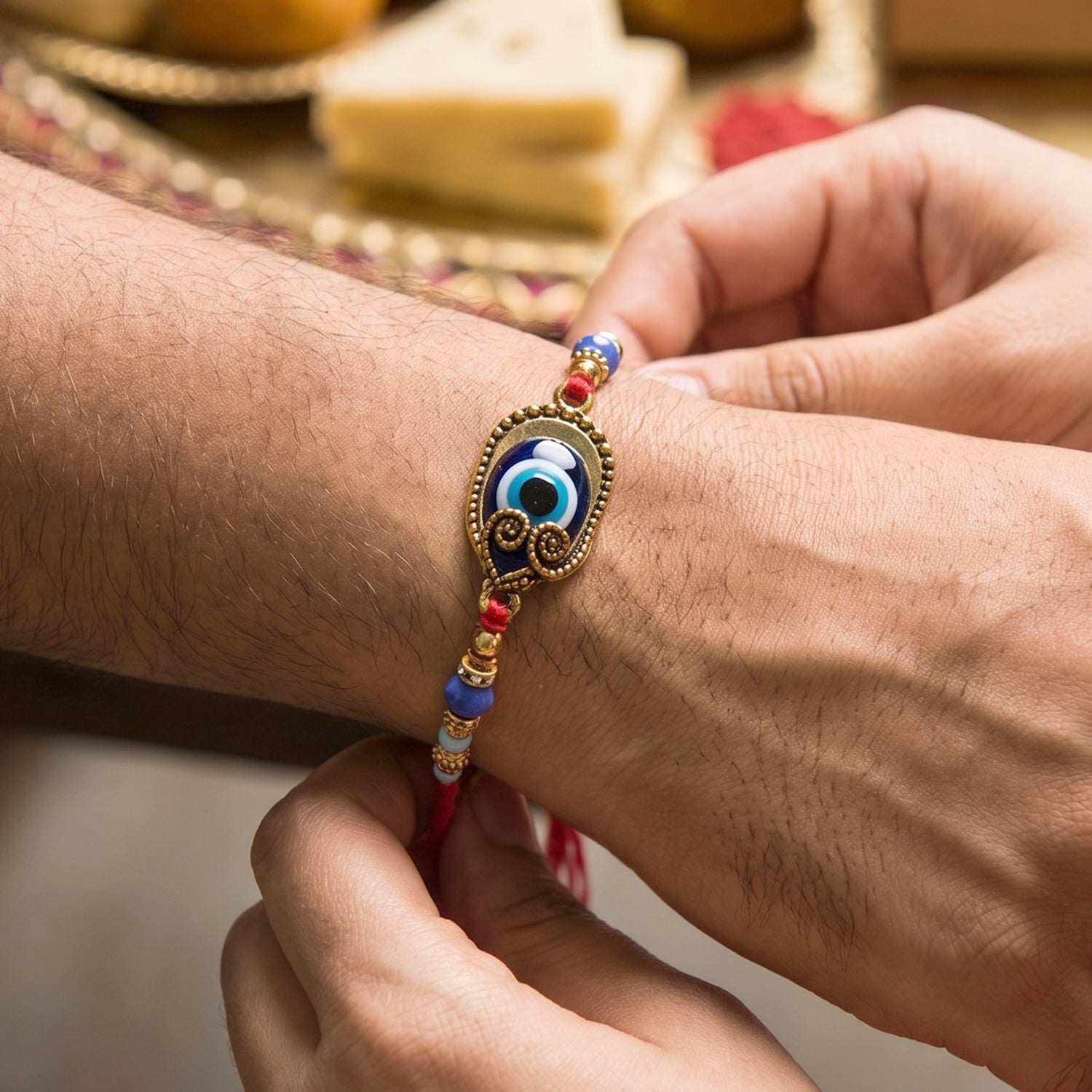 Evil Eye Bhabhi Rakhi displayed on decorative surface