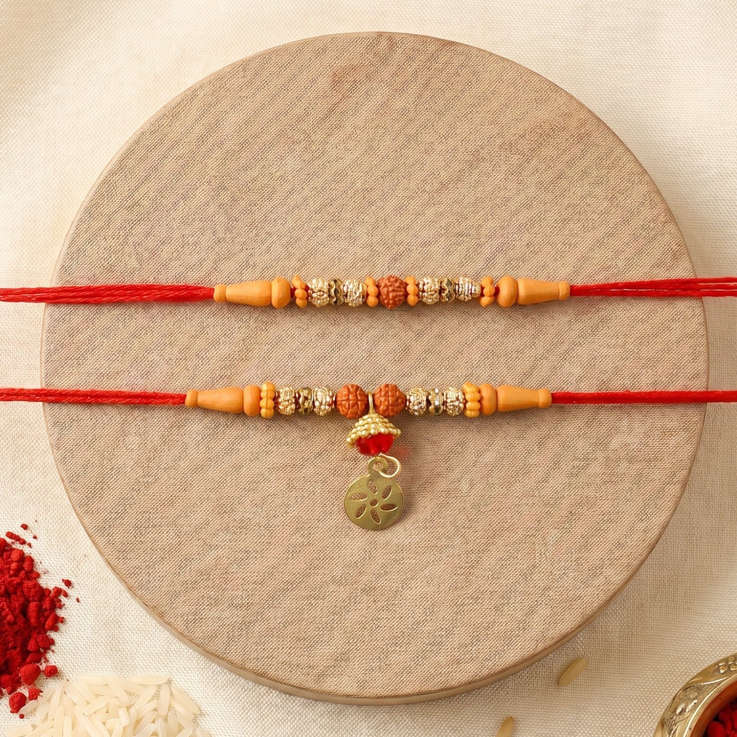 Close-up of Om Charm on Rudraksha Bhabhi Rakhi