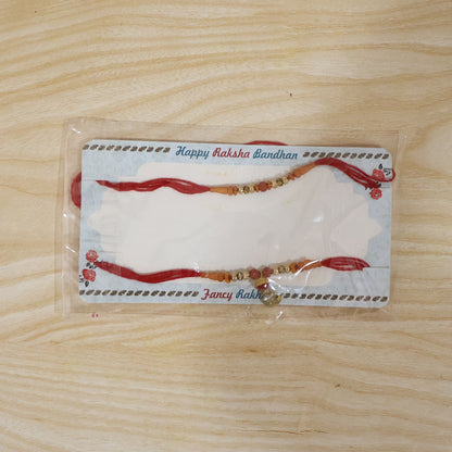 Elegant Rudraksha Bead Bhabhi Rakhi with Om Charm packaging