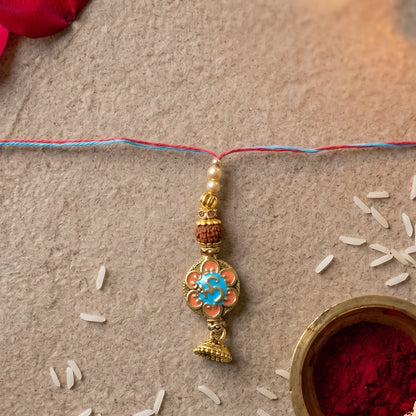 Pearl Latkan hanging from Peacock Stone Bhabhi Rakhi