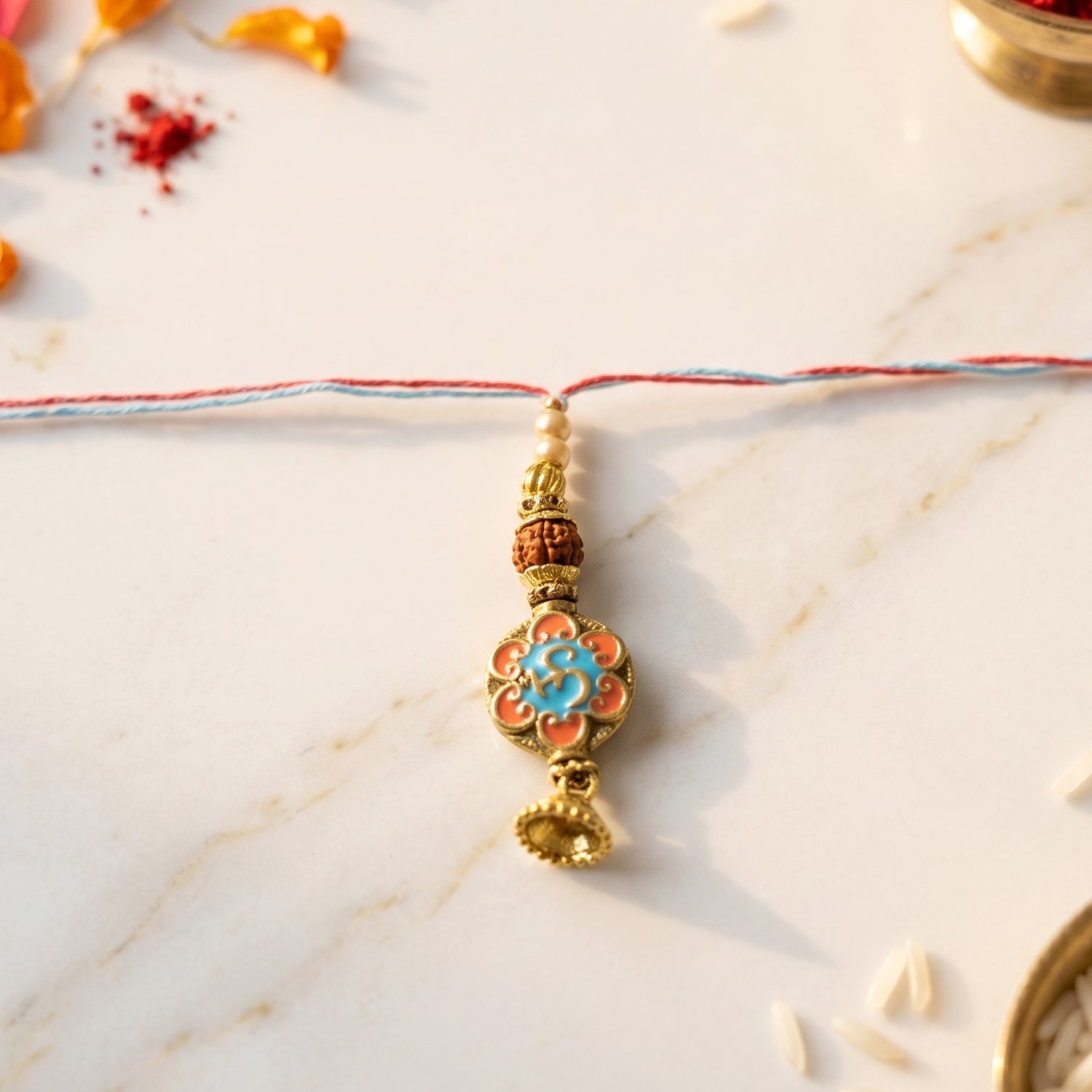 Side view of Blue Floral Bhabhi Rakhi and thread colors