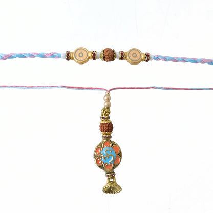 Blue Floral Bhabhi Rakhi with colorful threads displayed flat