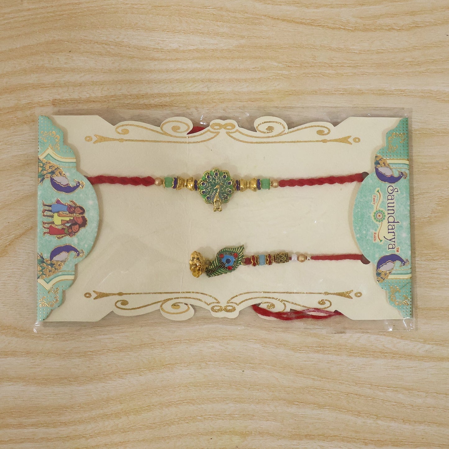 Latkan detail on Peacock Bhabhi Rakhi with green stones