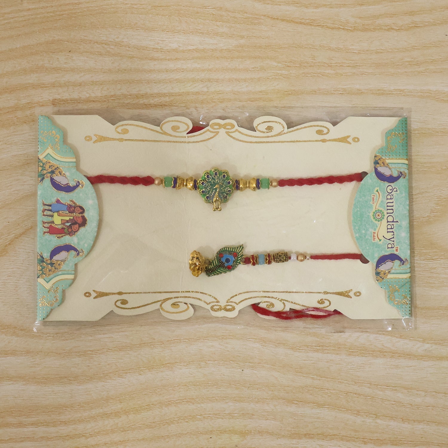 Latkan detail on Peacock Bhabhi Rakhi with green stones