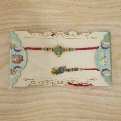 Latkan detail on Peacock Bhabhi Rakhi with green stones