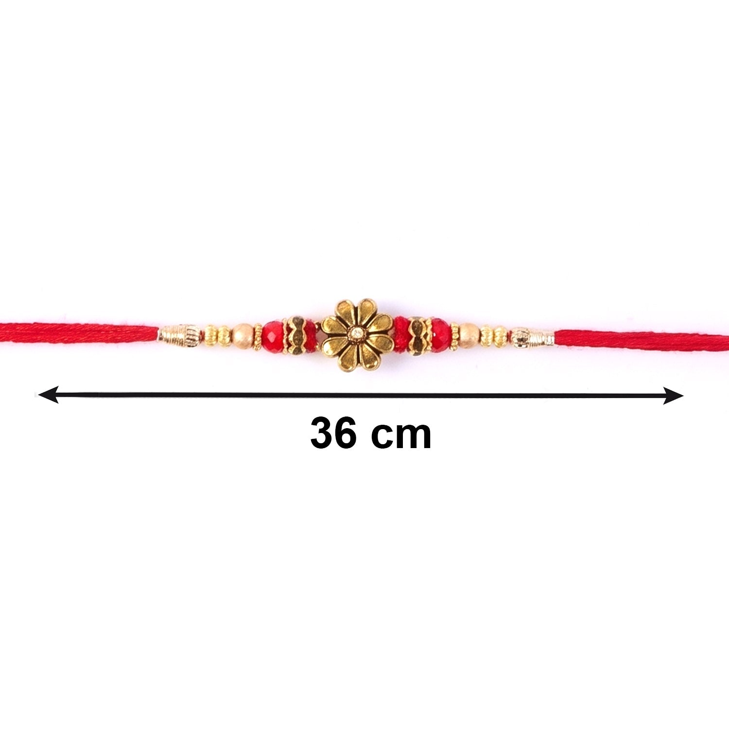 Close-up of pearl beads on golden floral designer Rakhi