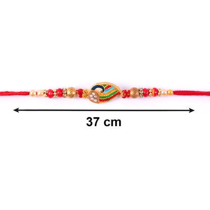 Hand holding Peacock Meenakari Designer Rakhi