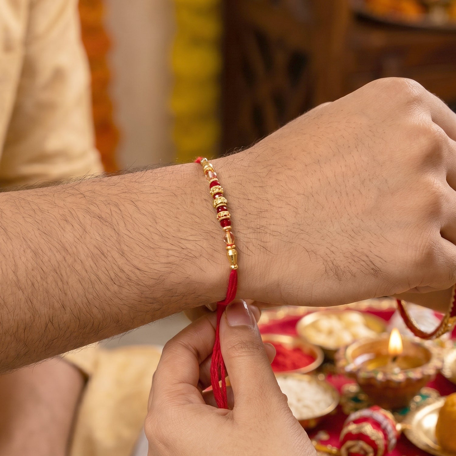 Peacock latkan Bhabhi Rakhi showing pearl beads