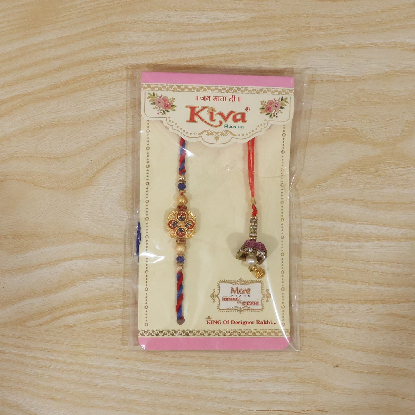 Elegant floral rakhi featuring peacock latkan and pearls
