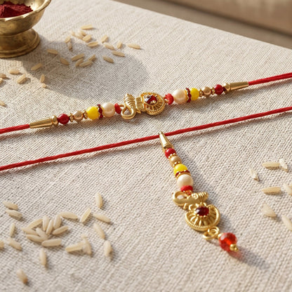 Golden Ganesha rakhi showing intricate pearl bead details