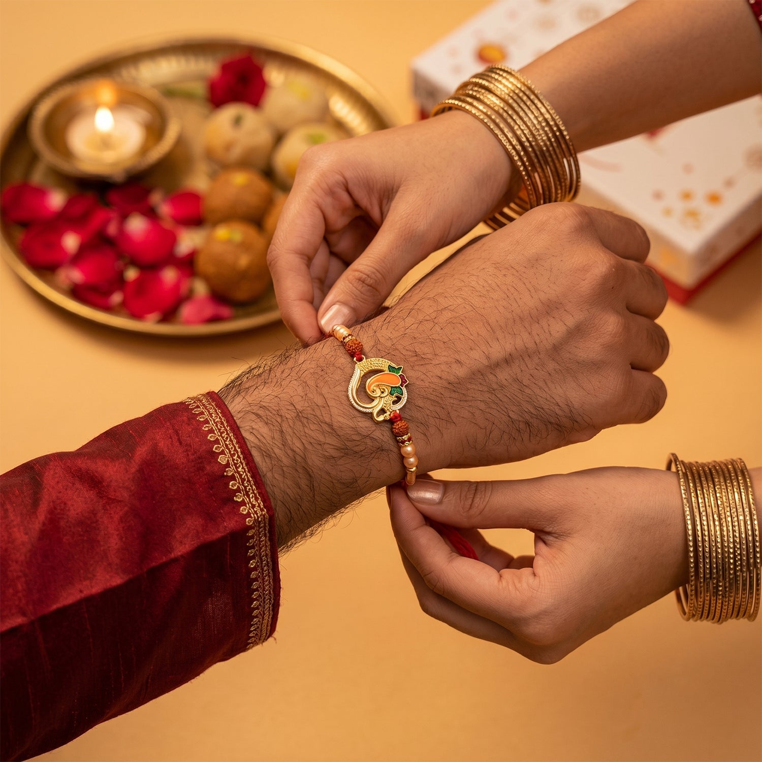 Rakhi showcasing decorative beads and Ganesh centerpiece