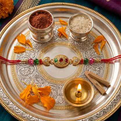 Traditional Rakhi with colorful beads and golden design