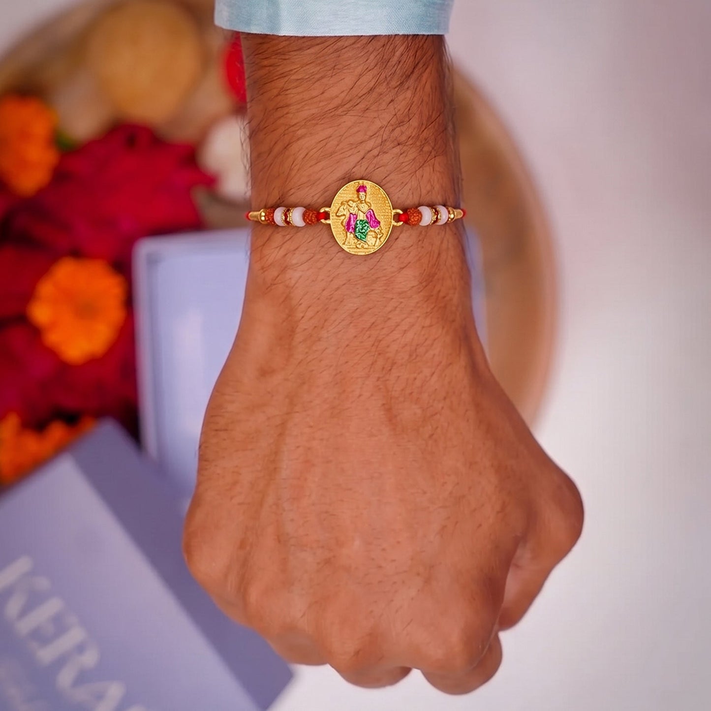 Decorative beads on Lord Krishna rakhi thread