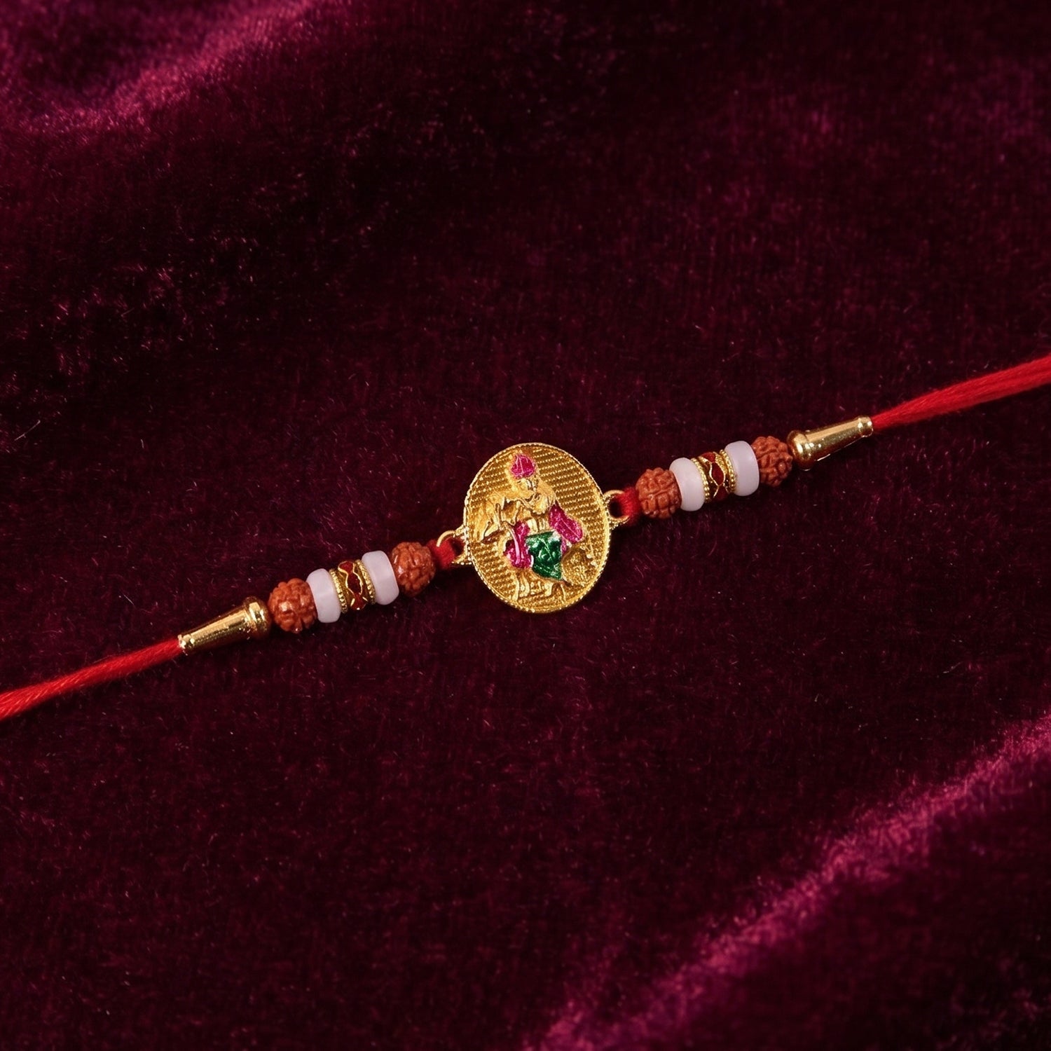 Detailed view of Lord Krishna centerpiece on rakhi
