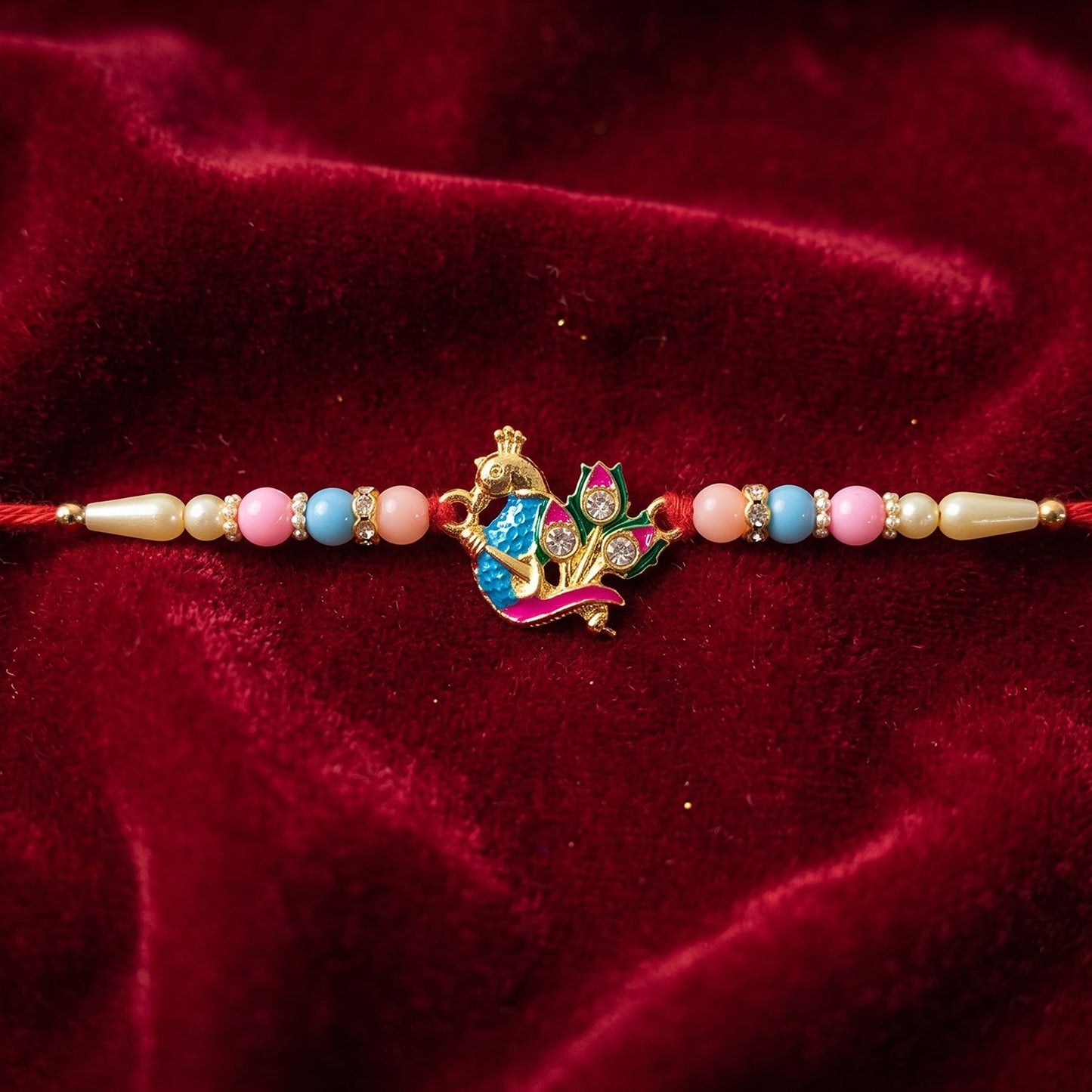 Designer Peacock Rakhi with Pastel Beads (1 Pc)