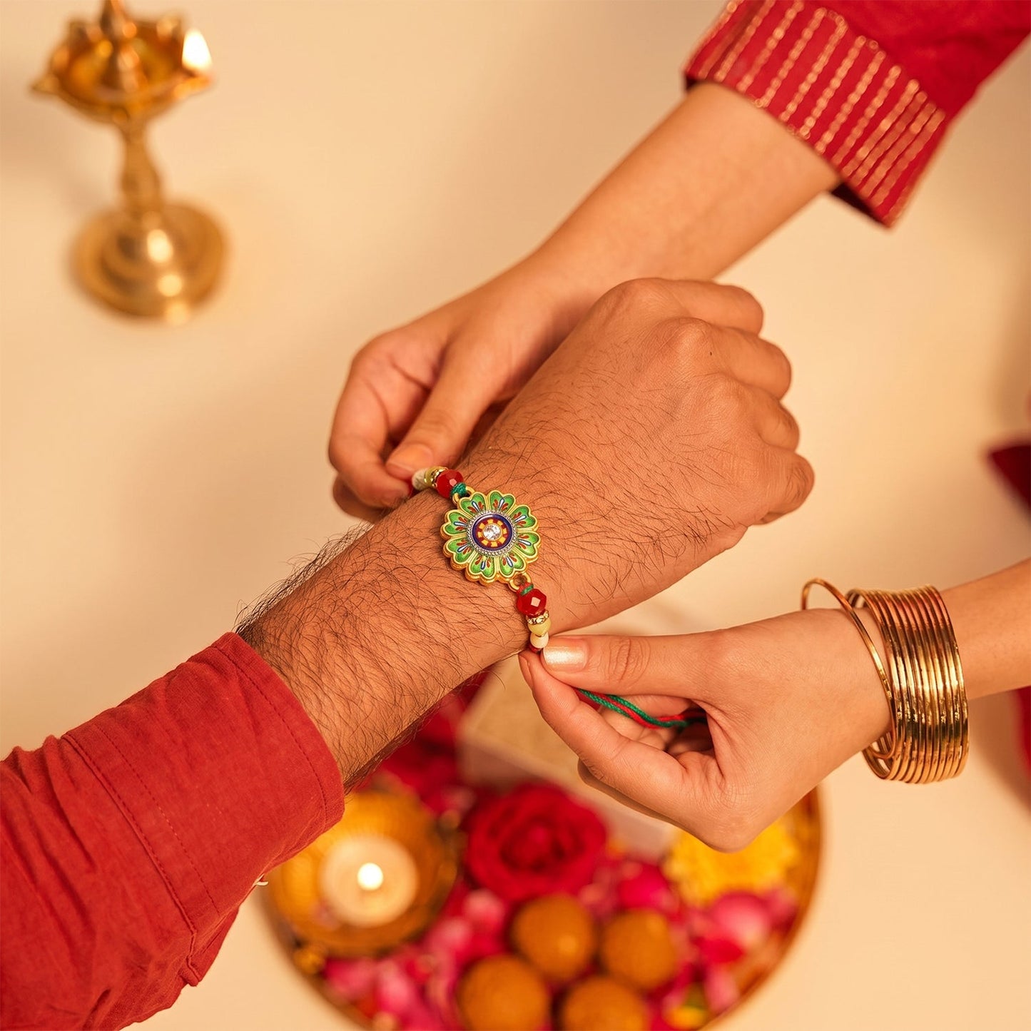 Floral Round Design Rakhi with Colorful Beads (1 Pc)