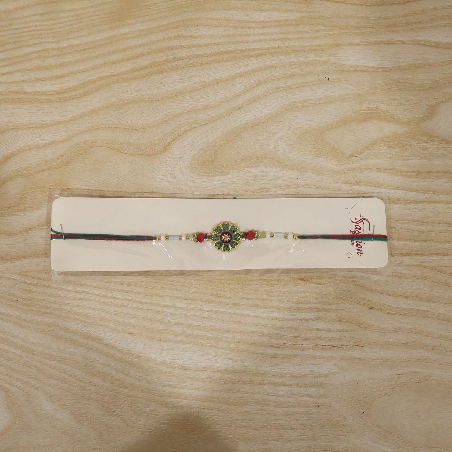 Floral Round Design Rakhi with Colorful Beads (1 Pc)