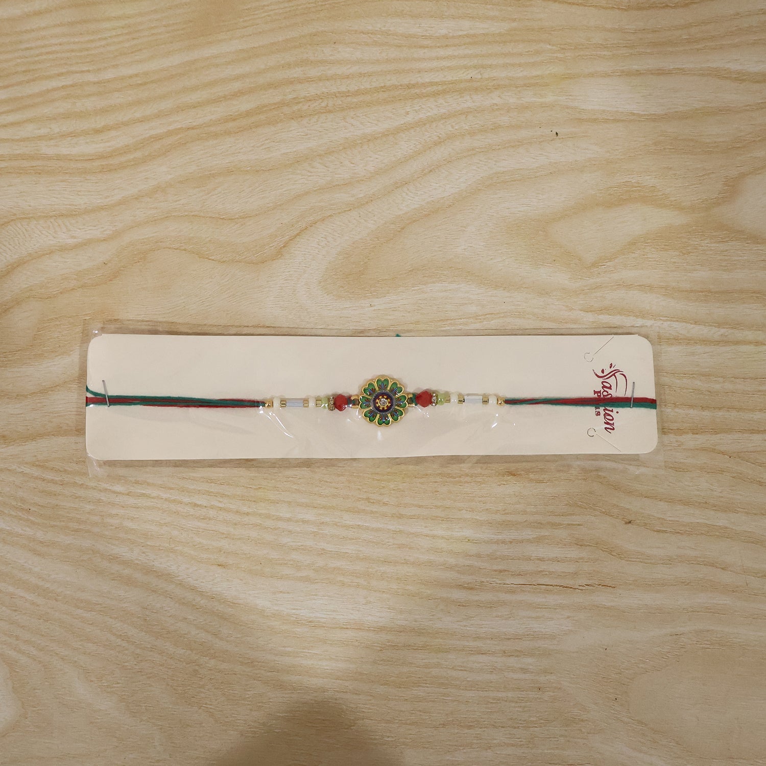 Floral Round Design Rakhi with Colorful Beads (1 Pc)