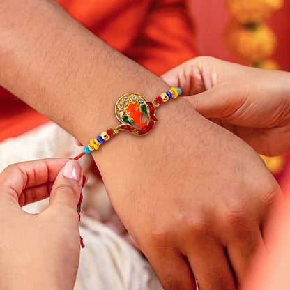 Close-up of Ganesh design centerpiece on Rakhi