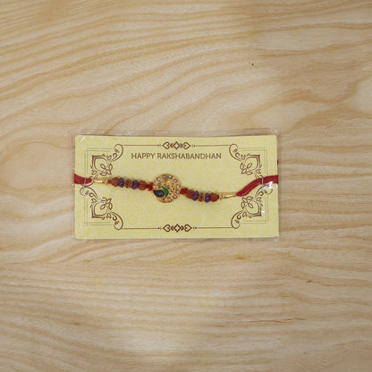 Complete Peacock Design Rakhi with decorative elements