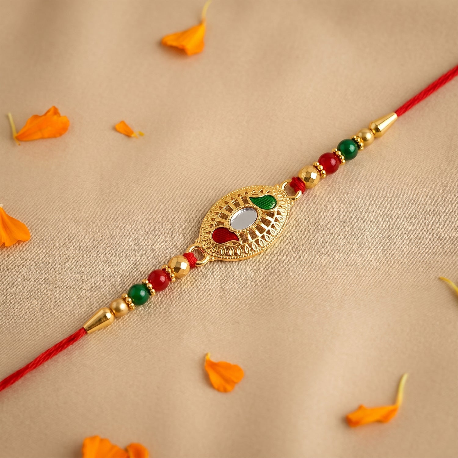 Golden Oval Design Rakhi with Colorful Beads (1 Pc)