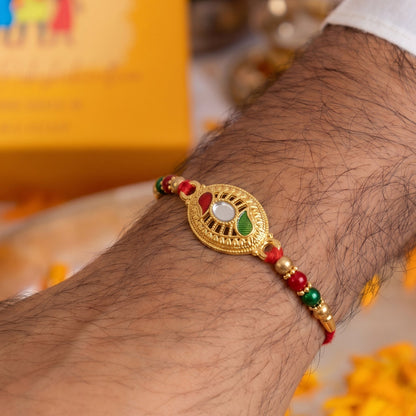Golden Oval Design Rakhi with Colorful Beads (1 Pc)