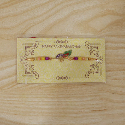 Peacock Feather Flute Design Rakhi with Beads (1 Pc)