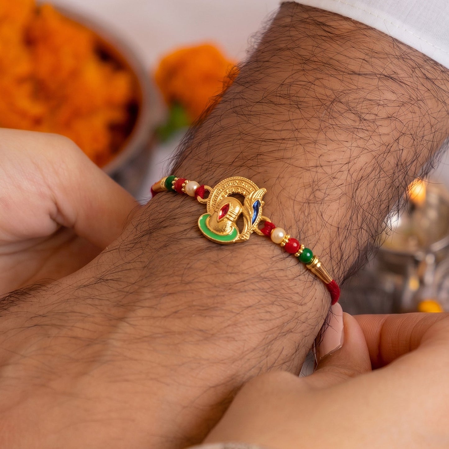 Traditional Shivling Rakhi with decorative beads