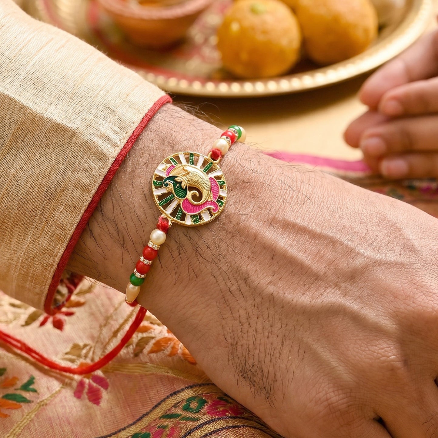 Colorful beaded Rakhi showcasing soft thread and intricate centerpiece
