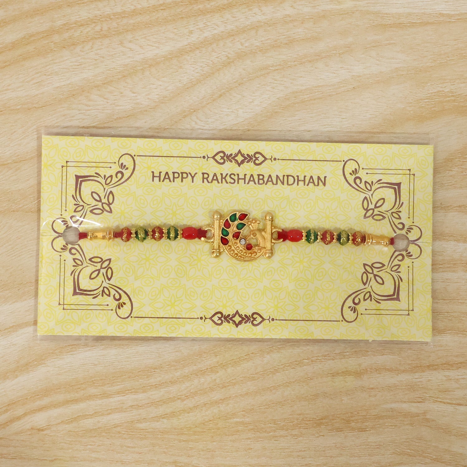 Golden Peacock Design Rakhi with Colorful Beads (1 Pc)
