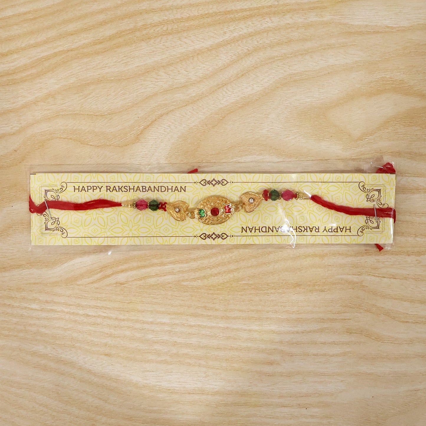 Gold Stone Designer Rakhi full length view
