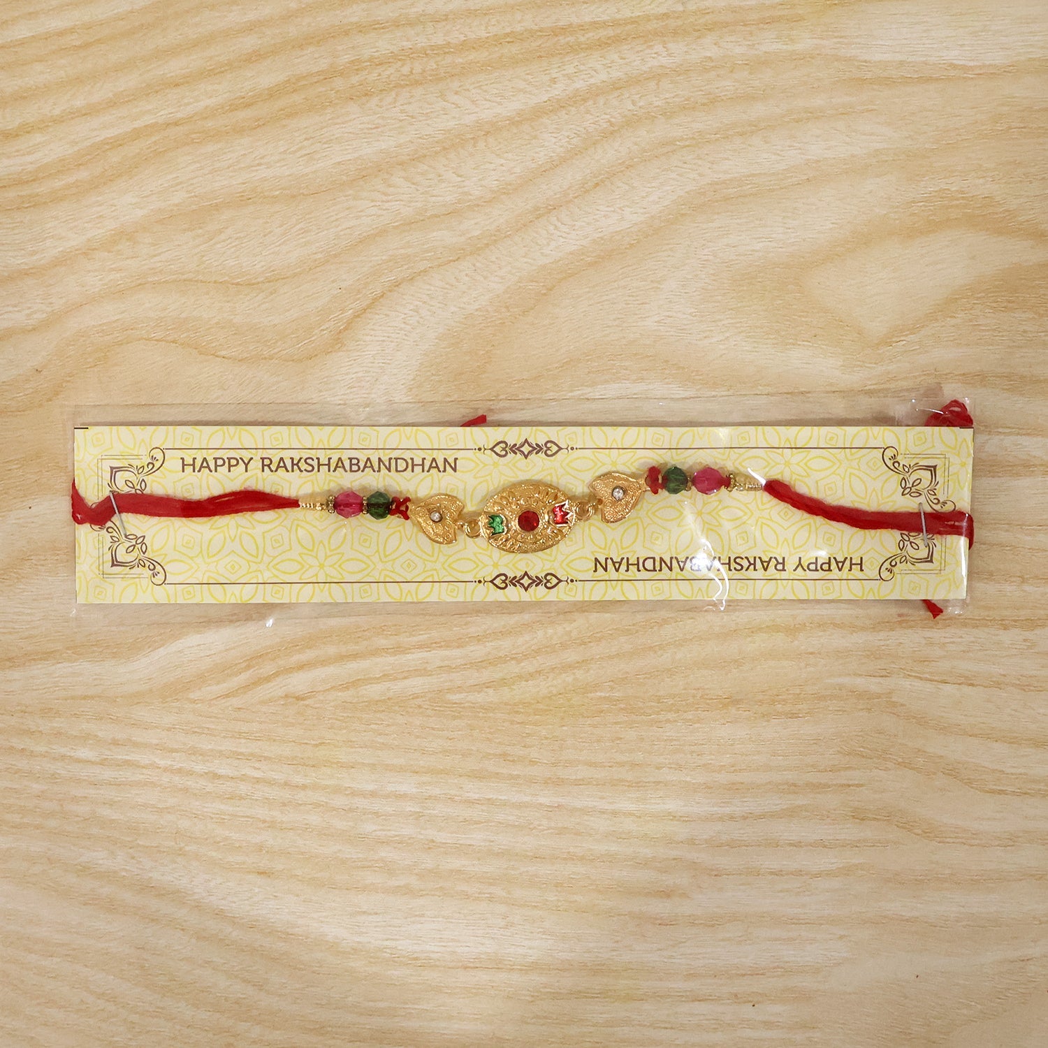 Gold Stone Designer Rakhi full length view