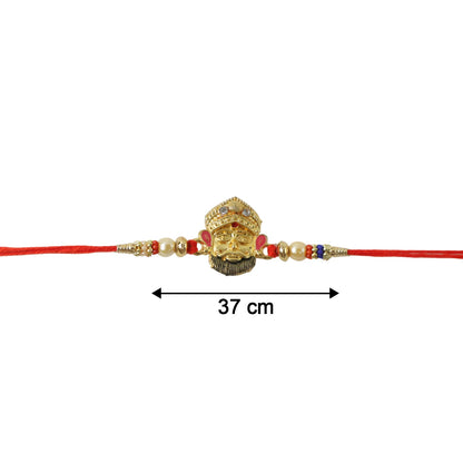 Top view of traditional rakhi with red thread and bead design