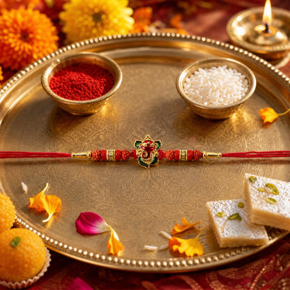 Ganesh Designer Rakhi tied with red thread detail