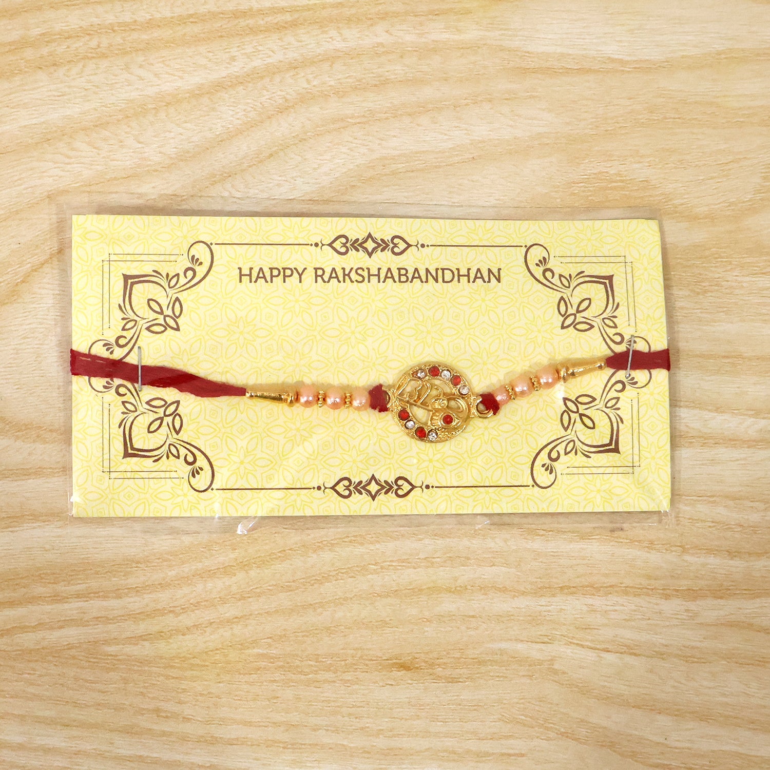 Festive setting featuring Radhe Designer Rakhi on red background
