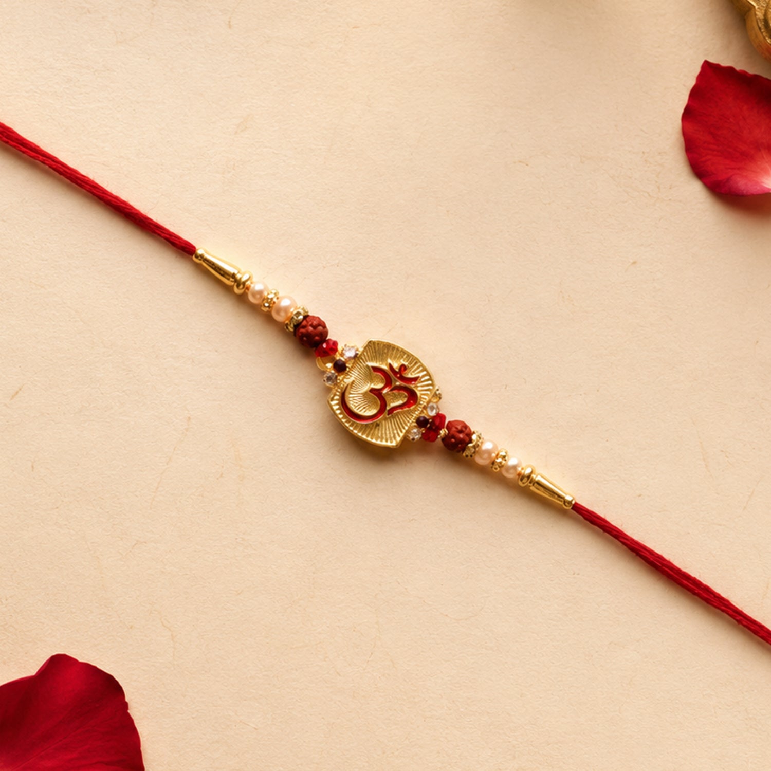 Front view of Om Designer Rakhi with Rudraksha Beads