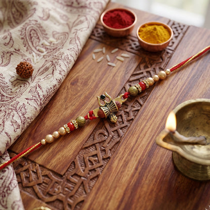 Damru Trishul rakhi tied with threads