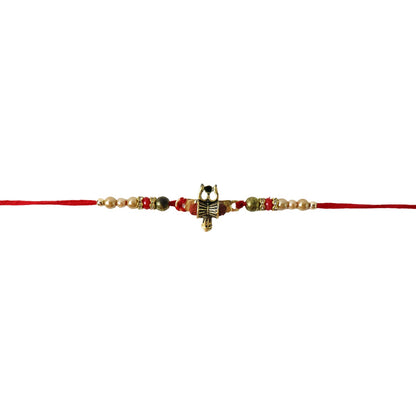 Damru Trishul rakhi with bead embellishments