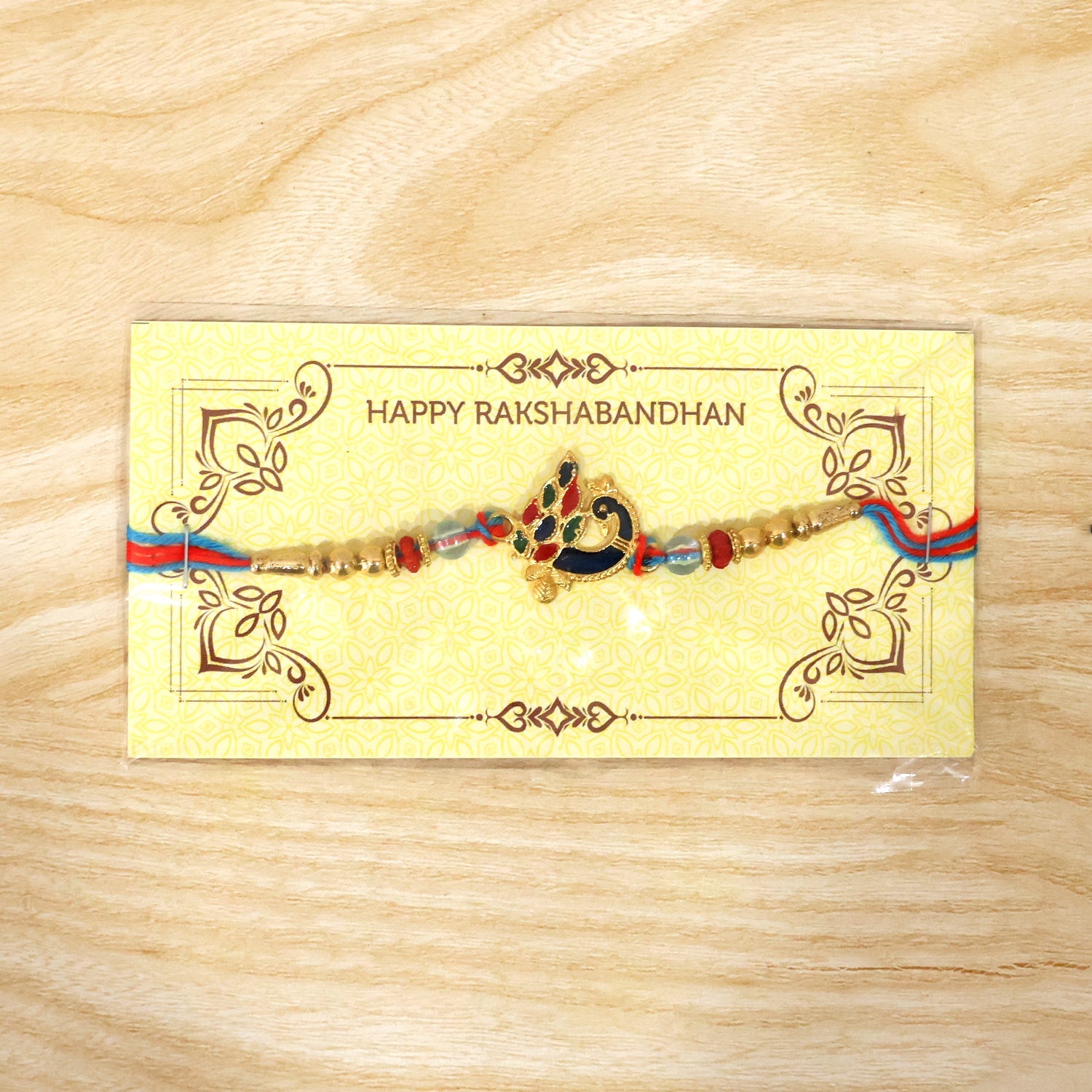 Peacock Designer Rakhi closeup of peacock design with beads