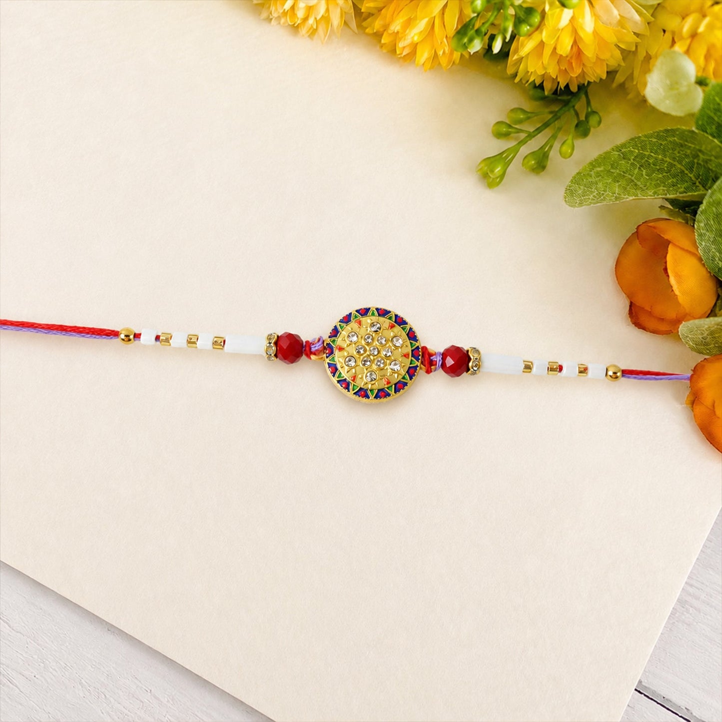 Designer Round Stone Rakhi with White Beads tied style