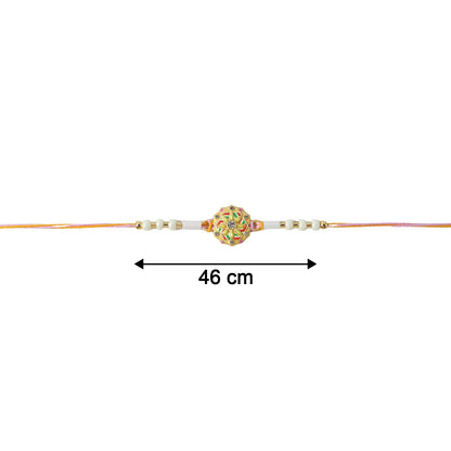 Designer rakhi showcasing floral pattern and beads